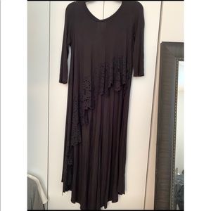 NWOT FREE PEOPLE Assymetrical 1/4 Sleeve Black Top